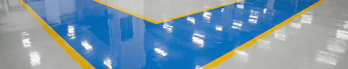 A factory floor professionally covered and marked with epoxy flooring in Las Vegas, NV