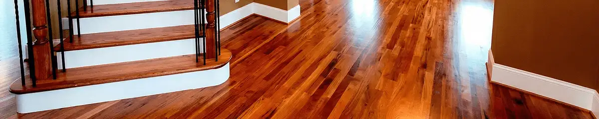 Base floor of a staircase with professionally restored wood flooring in Las Vegas NV