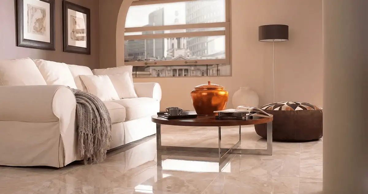 Modern living room with professionally installed marble flooring, a beige sofa, coffee table in Las Vegas, NV